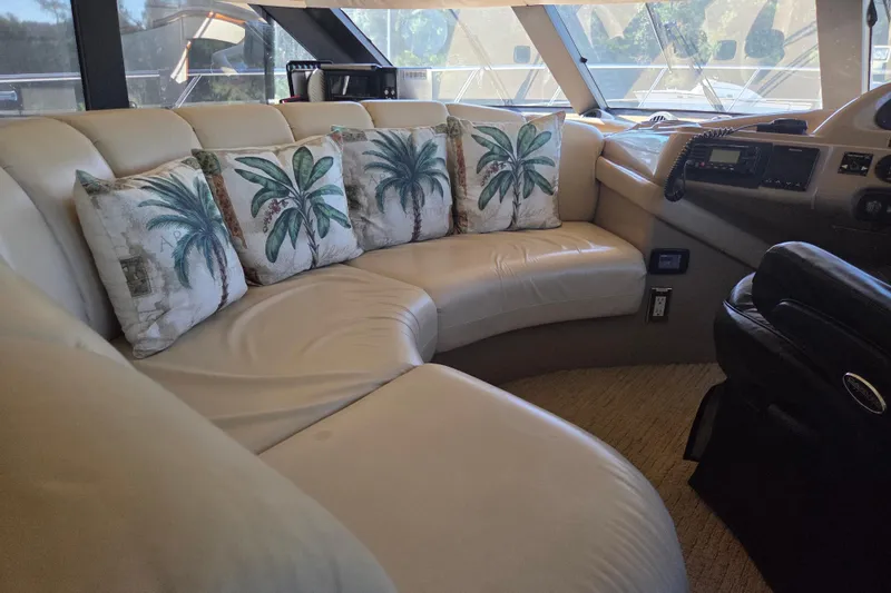 Slide: The Image of Luxurious interior of 2000 Carver 450 Voyager Pilothouse with palm-themed cushions. - 44