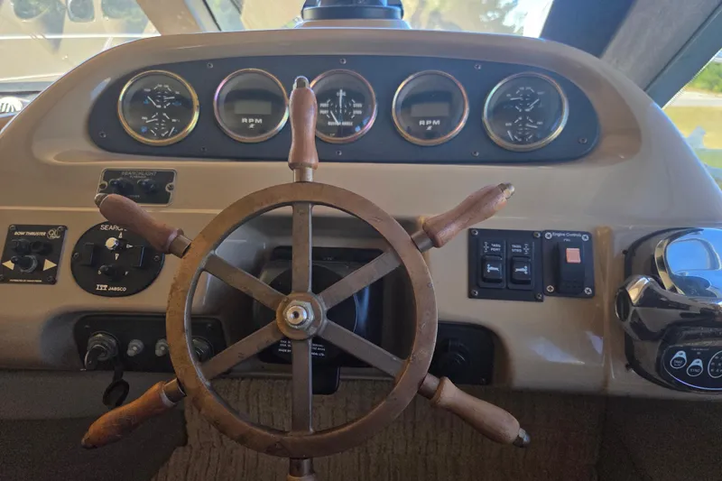 Slide: The Image of Steering wheel and dashboard of 2000 Carver 450 Voyager Pilothouse yacht. - 46