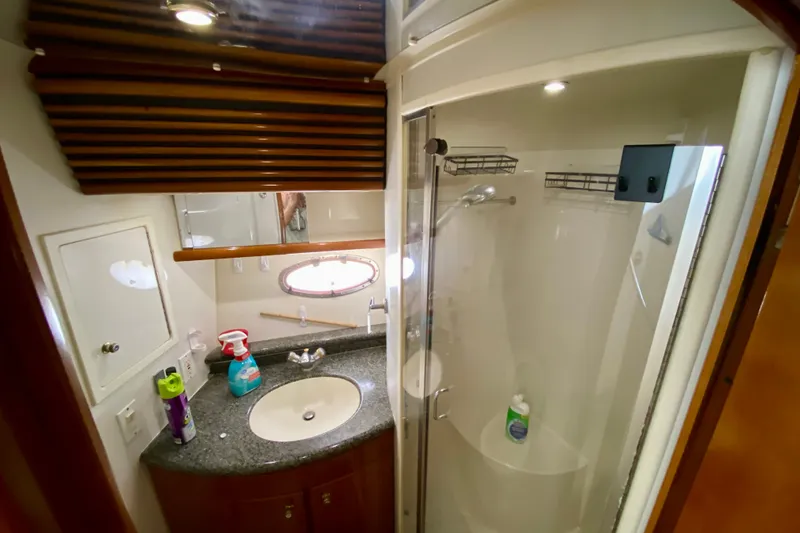 Slide: The Image of Bathroom interior of 2000 Carver 450 Voyager Pilothouse with shower and sink. - 40