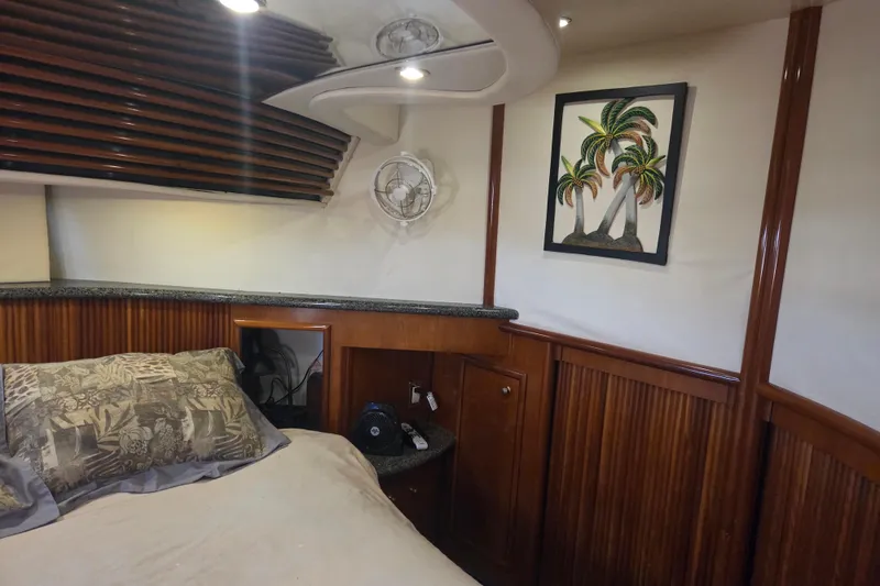 Slide: The Image of Cozy cabin interior of 2000 Carver 450 Voyager Pilothouse with tropical decor. - 60