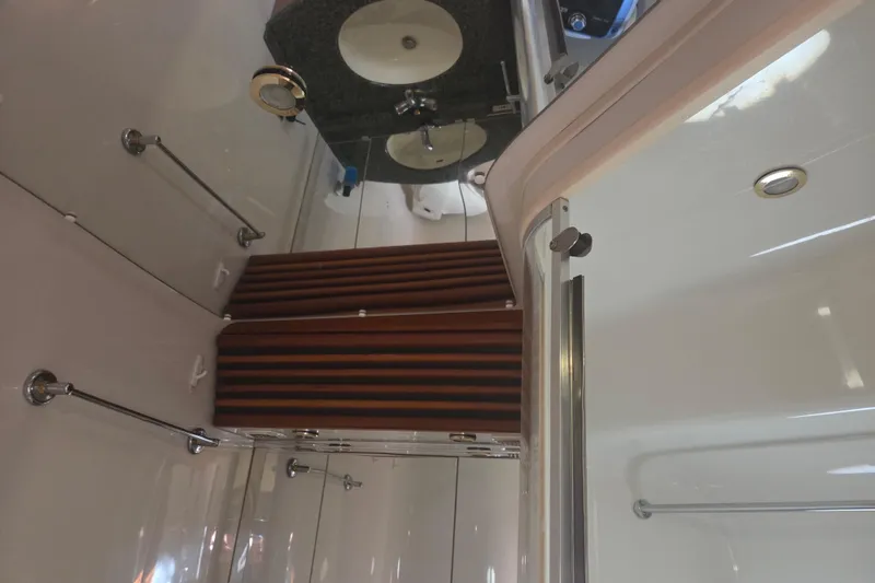 Slide: The Image of Bathroom interior of 2000 Carver 450 Voyager Pilothouse with sink and shower. - 67