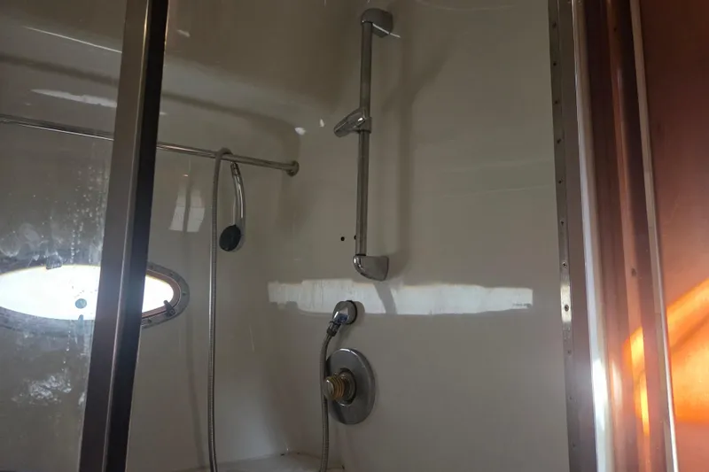 Slide: The Image of Shower area in 2000 Carver 450 Voyager Pilothouse yacht bathroom. - 68