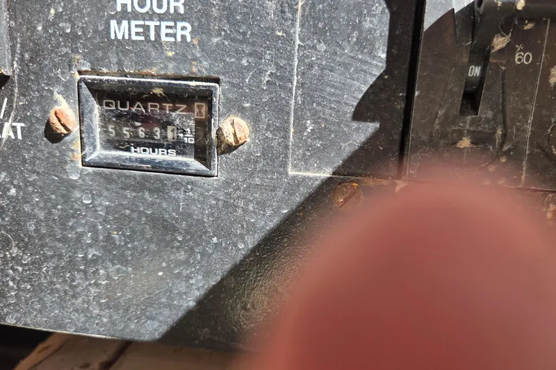 Slide: The Image of Hour meter reading on a 2000 Carver 450 Voyager Pilothouse boat. - 81