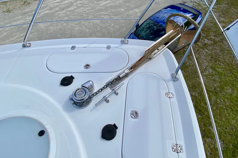 Slide: The Image of Deck view of 2000 Carver 450 Voyager Pilothouse with anchor and winch system. - 78