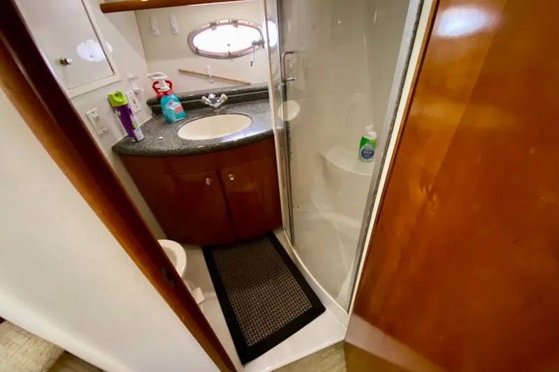 Slide: The Image of Bathroom interior of 2000 Carver 450 Voyager Pilothouse with sink and shower. - 39