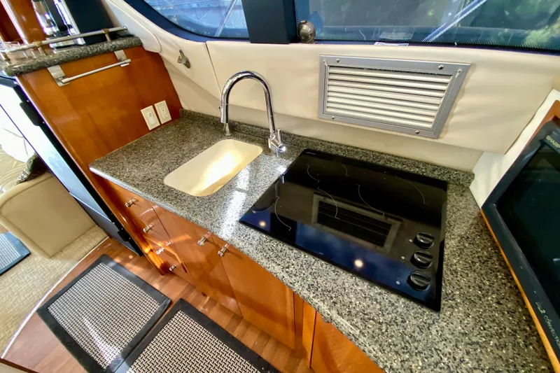 Slide: The Image of Modern kitchen area in a 2000 Carver 450 Voyager Pilothouse yacht. - 56
