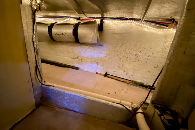 Slide: The Image of Interior view of 2000 Carver 450 Voyager Pilothouse with insulation and wiring. - 46