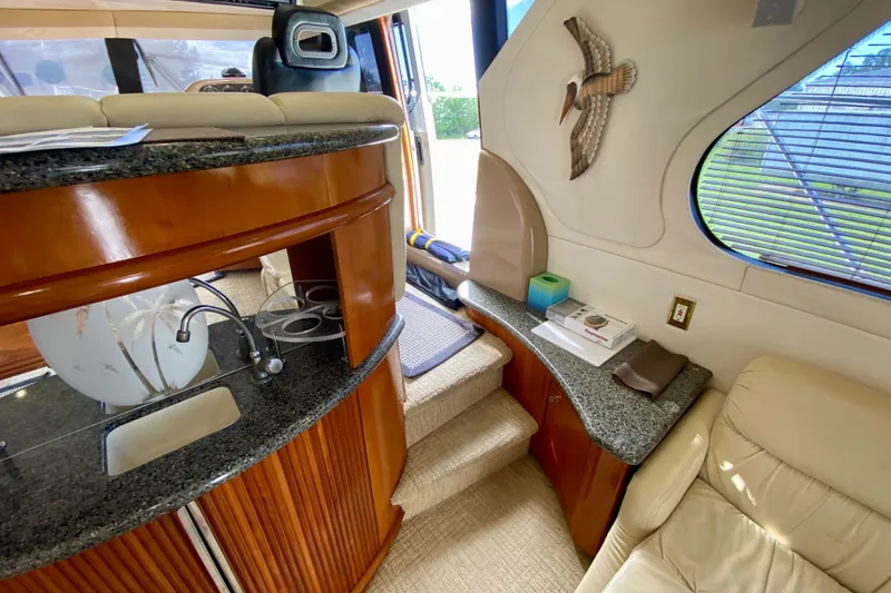 Slide: The Image of Interior of 2000 Carver 450 Voyager Pilothouse with elegant wood and granite finishes. - 63