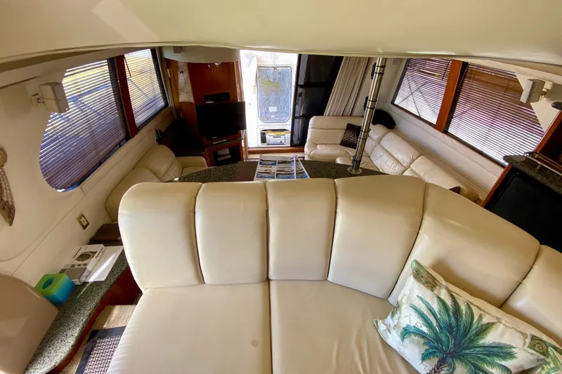 Slide: The Image of Luxurious interior of 2000 Carver 450 Voyager Pilothouse with plush seating and elegant decor. - 70