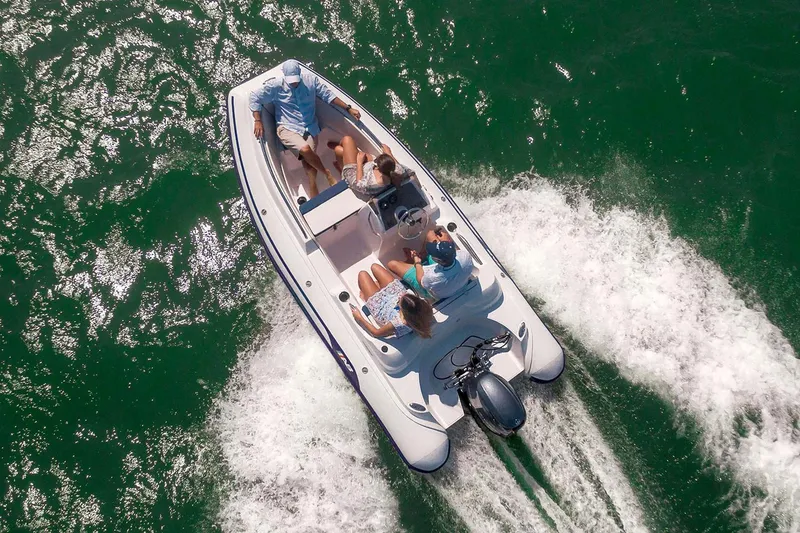 Slide: The Image of Manufacturer Provided Image: Aerial view of AB Inflatables Nautilus 14 DLX boat on water. - 3