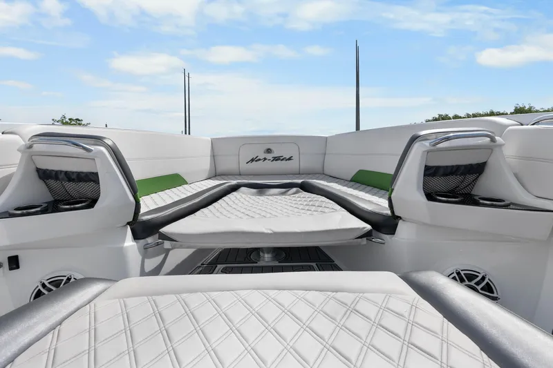 Slide: The Image of 2021 Nor-Tech 390 Sport Center Console interior with luxurious seating and modern design. - 12