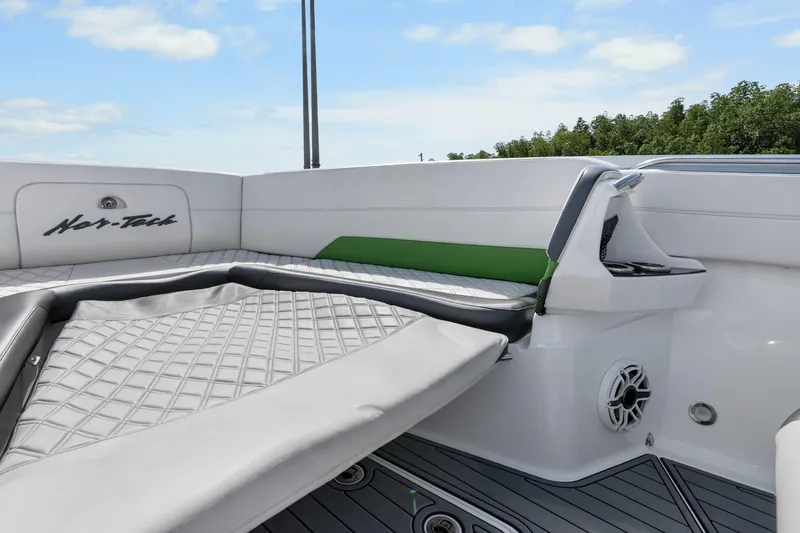 Slide: The Image of 2021 Nor-Tech 390 Sport Center Console interior with luxurious seating and modern design. - 13