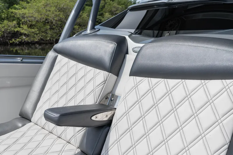 Slide: The Image of Luxurious seating on 2021 Nor-Tech 390 Sport Center Console with diamond-stitched upholstery. - 17