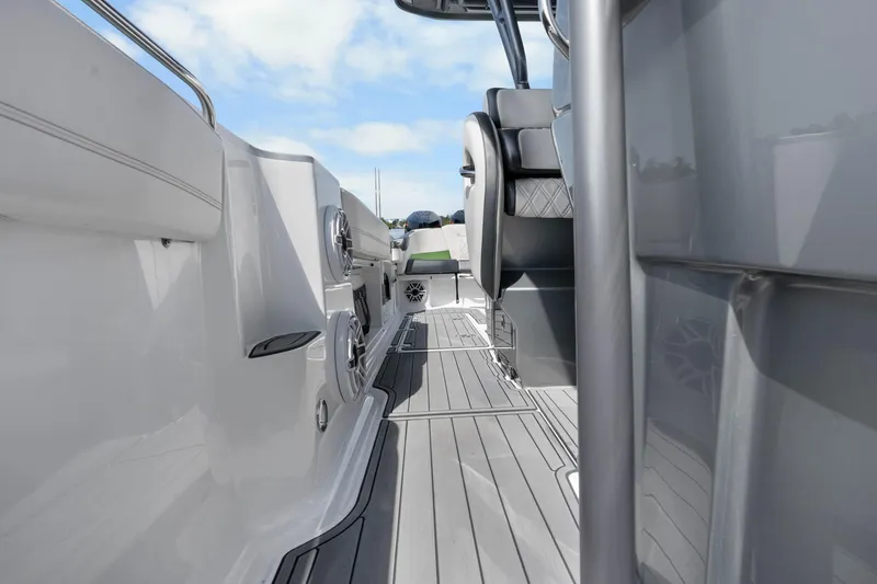 Slide: The Image of 2021 Nor-Tech 390 Sport Center Console boat interior with sleek design and modern features. - 18