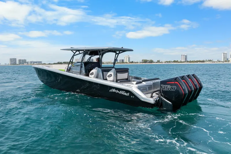 Slide: The Image of 2021 Nor-Tech 390 Sport Center Console boat cruising on open water. - 44