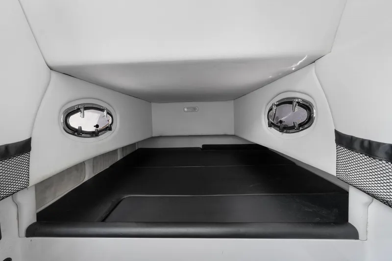 Slide: The Image of Interior cabin of 2021 Nor-Tech 390 Sport Center Console boat, featuring sleek design. - 9