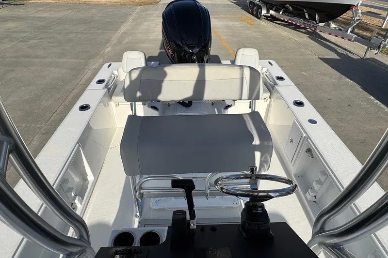 Slide: The Image of Interior view of 2026 Bay Rider 2460 FS Skiff with helm. - 11