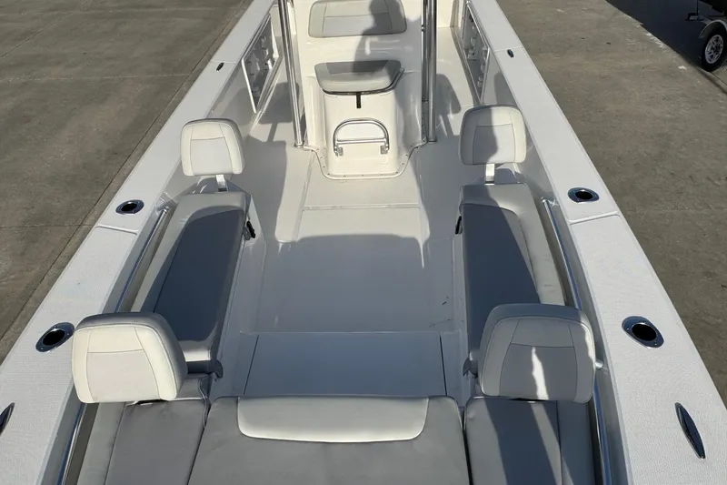 Slide: The Image of Interior of 2026 Bay Rider 2460 FS Skiff with gray seating. - 5