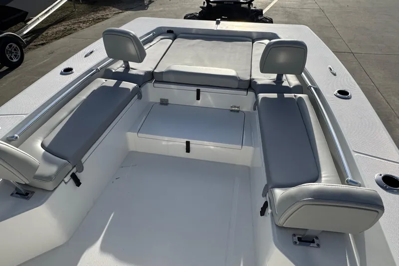 Slide: The Image of Bay Rider 2460 FS Skiff 2026 with gray cushions and seat backs. - 6