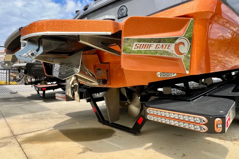 Slide: The Image of 2023 Malibu Wakesetter 23 LSV boat with Surf Gate technology, rear view. - 22