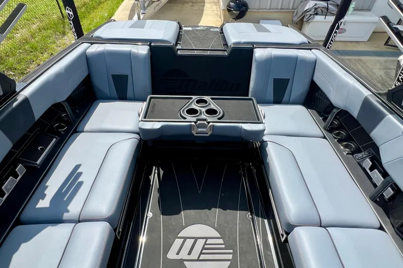 Slide: The Image of Luxurious interior of 2023 Malibu Wakesetter 23 LSV boat with spacious seating and cup holders. - 9