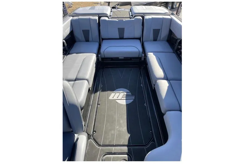 Slide: The Image of 2023 Malibu Wakesetter 23 LSV interior with spacious seating and sleek design. - 7