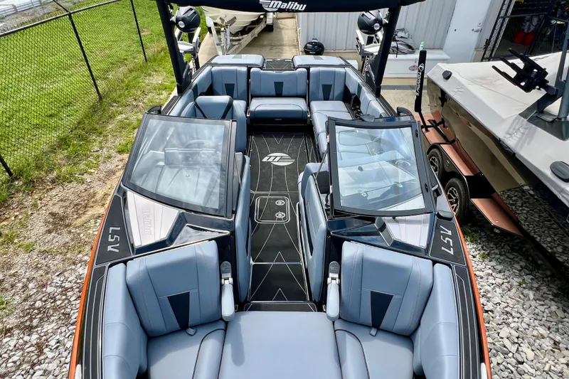 Slide: The Image of 2023 Malibu Wakesetter 23 LSV boat interior with sleek seating and modern design. - 7