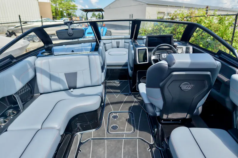 Slide: The Image of Interior of 2023 Malibu Wakesetter 23 LSV boat with sleek seating and modern dashboard. - 4