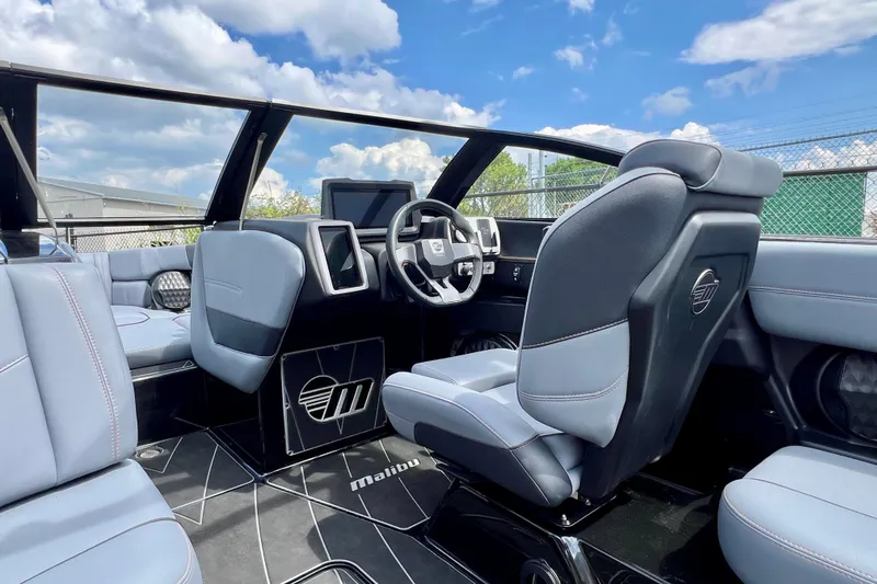 Slide: The Image of 2023 Malibu Wakesetter 23 LSV interior with sleek design and modern dashboard. - 18