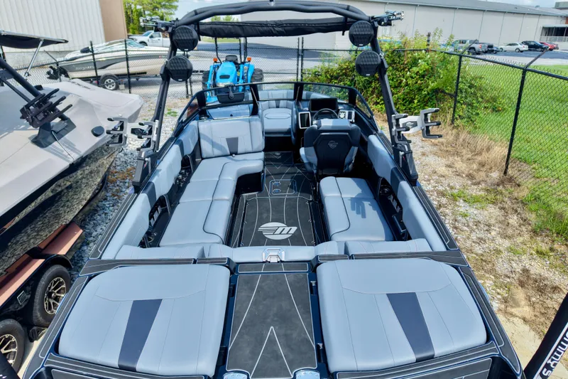 Slide: The Image of 2023 Malibu Wakesetter 23 LSV boat interior with spacious seating and modern design. - 3