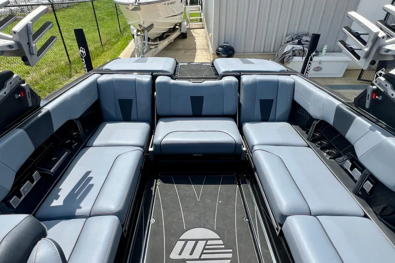Slide: The Image of 2023 Malibu Wakesetter 23 LSV interior with spacious seating and sleek design. - 8