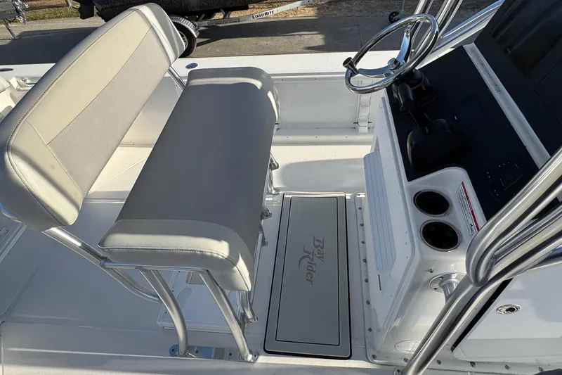 Slide: The Image of Interior view of Bay Rider 2460 FS Skiff 2026 with helm console. - 10