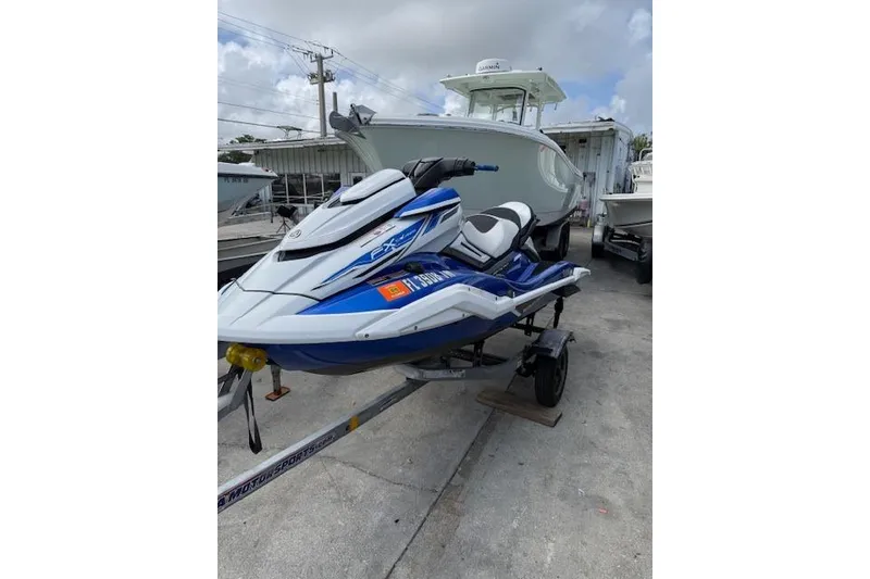 The Image of 2021 Yamaha WaveRunner FX Cruiser HO on trailer, parked outdoors. - 1