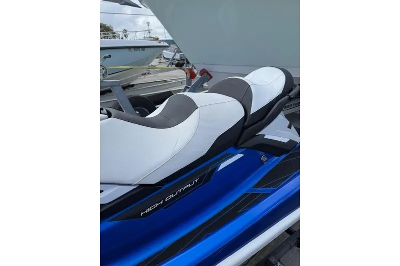 Slide: The Image of 2021 Yamaha WaveRunner FX Cruiser HO with sleek blue and white design. - 3