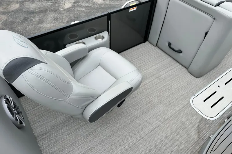 Slide: The Image of 2020 Veranda VTX22RC boat interior with gray seating and flooring. - 11