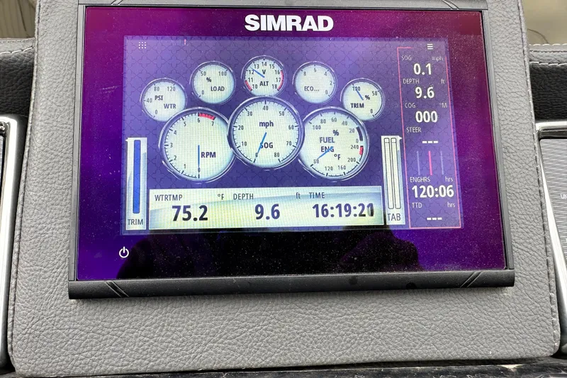 Slide: The Image of Simrad display on 2020 Veranda VTX22RC showing engine metrics and water temperature. - 12