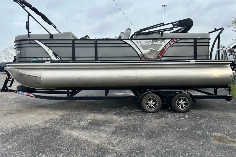 Slide: The Image of 2020 Veranda VTX22RC pontoon boat on trailer, side view. - 3