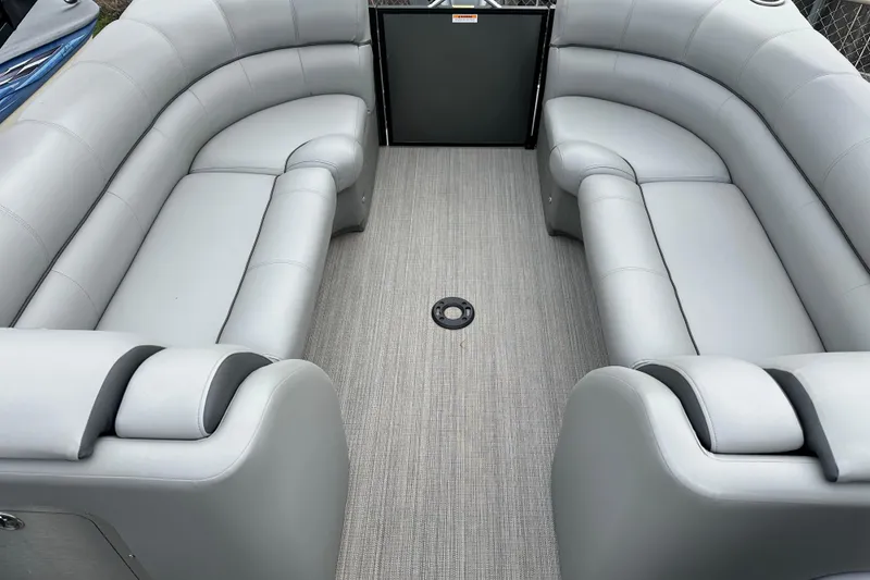 Slide: The Image of 2020 Veranda VTX22RC boat interior with gray seating and carpeted floor. - 7