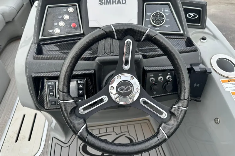 Slide: The Image of Steering wheel and dashboard of 2020 Veranda VTX22RC boat with control panel. - 8