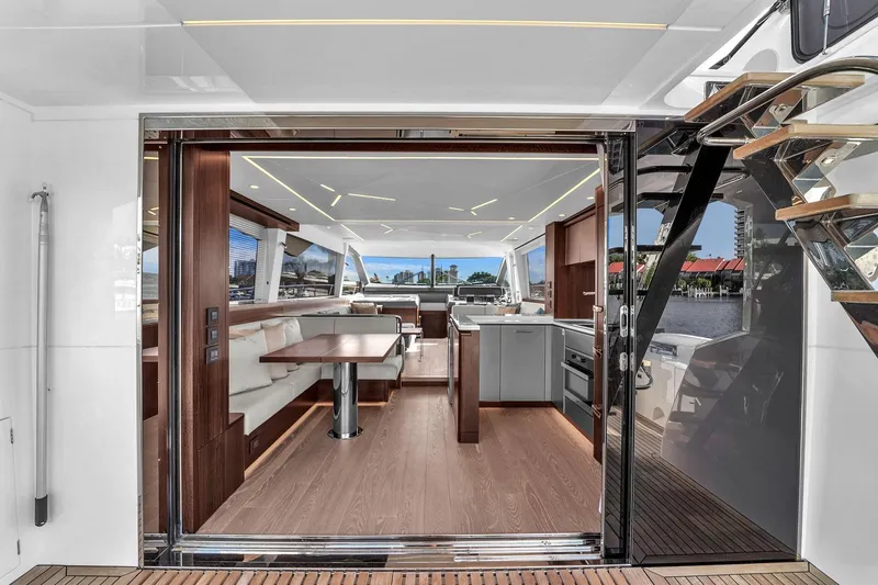 Slide: The Image of Luxurious interior of 2023 Sunseeker Manhattan 68 yacht with modern kitchen and dining area. - 44