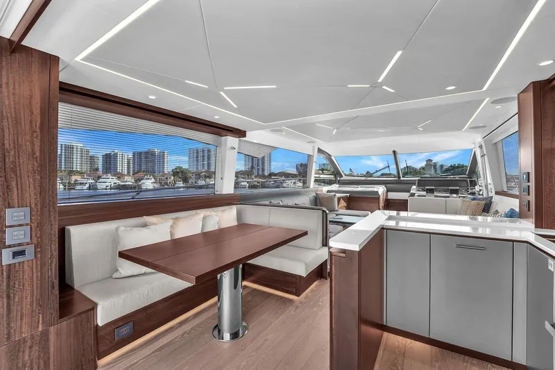 Slide: The Image of Luxurious interior of 2023 Sunseeker Manhattan 68 yacht with modern kitchen and scenic view. - 47
