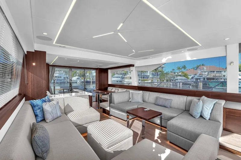 Slide: The Image of Luxurious interior of 2023 Sunseeker Manhattan 68 yacht with modern seating and panoramic windows. - 54