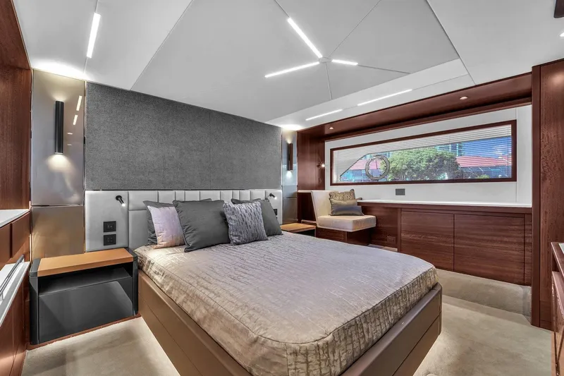 Slide: The Image of Luxurious 2023 Sunseeker Manhattan 68 yacht bedroom with modern design and elegant furnishings. - 69