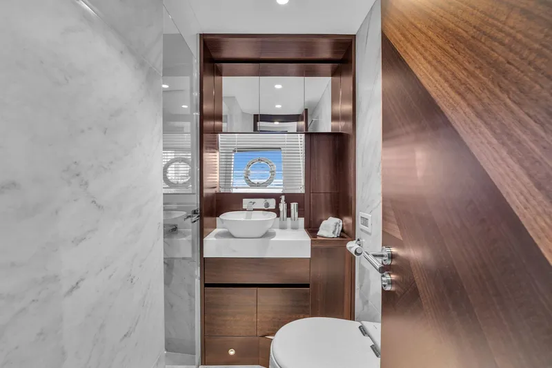 Slide: The Image of Luxurious bathroom in 2023 Sunseeker Manhattan 68 yacht with modern fixtures and elegant design. - 78