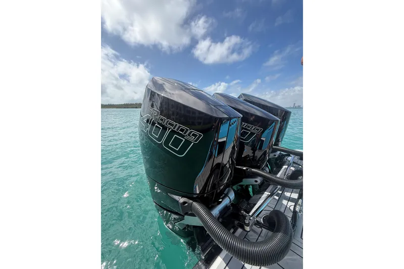 Slide: The Image of Triple Mercury Racing 400 engines on a 2025 Nor-Tech 340 Sport Center Console boat. - 12