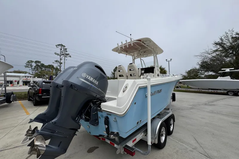 Slide: The Image of 2022 Sailfish 242 CC boat with Yamaha outboard engines on a trailer. - 9