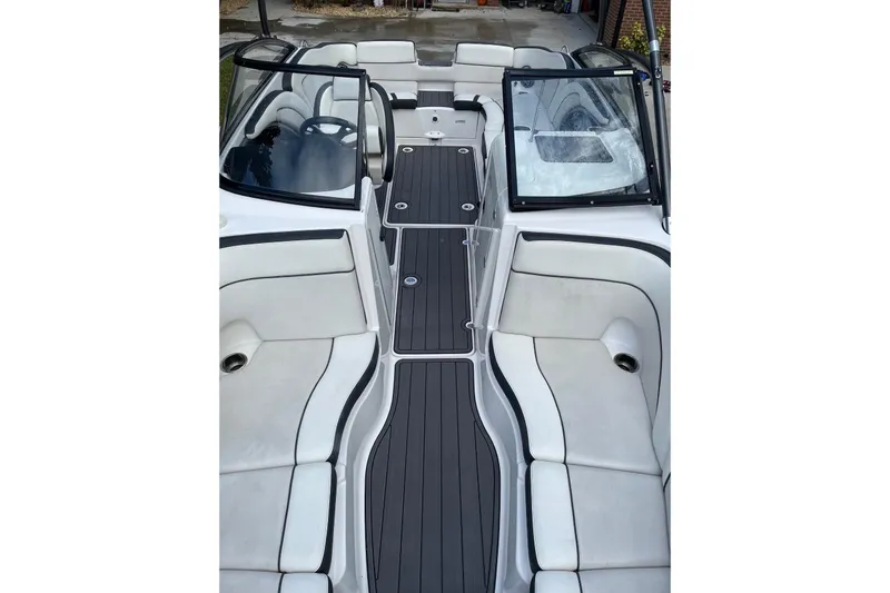 Slide: The Image of 2014 Yamaha Boats AR240 interior with sleek seating and modern design. - 2