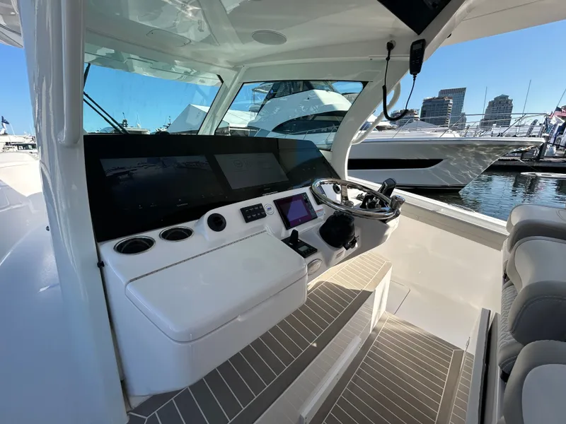 Slide: The Image of Interior view of 2026 Scout 435 LXF with modern helm station. - 1