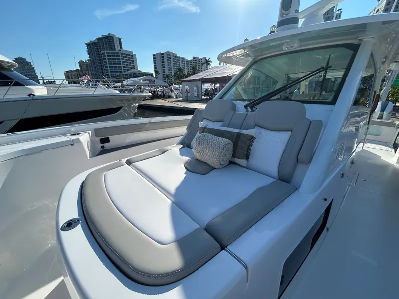 Slide: The Image of Luxurious deck of the 2026 Scout 435 LXF boat in harbor. - 10
