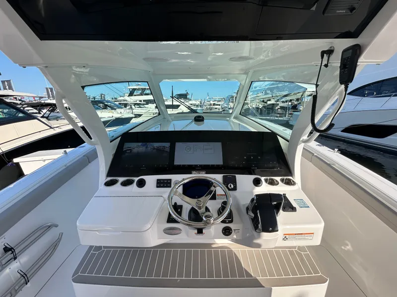 Slide: The Image of Interior view of 2026 Scout 435 LXF boat cockpit. - 2